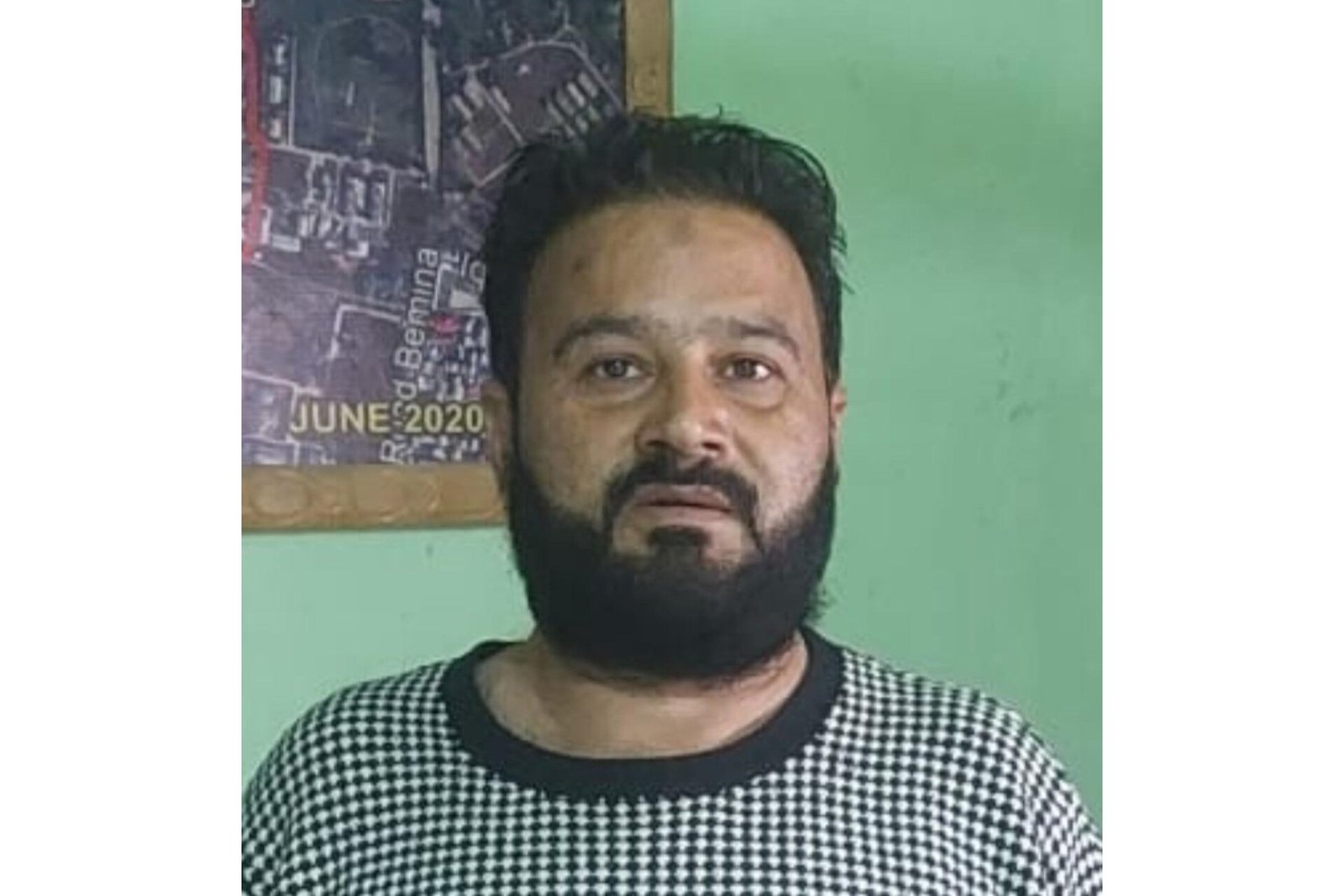 Srinagar Police arrested a habitual fraudster on charges of duping money